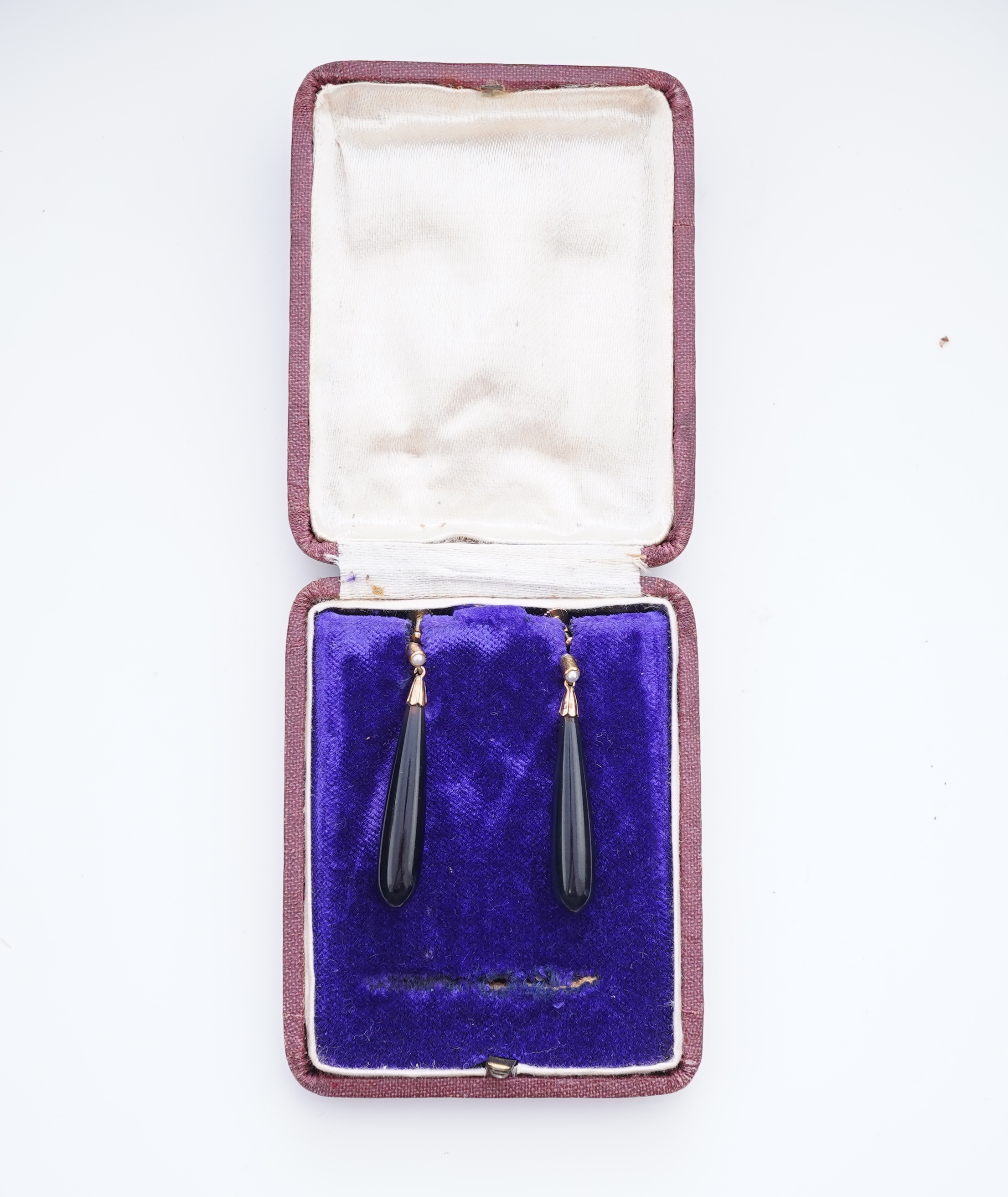 A pair of onyx and split pearl earrings, circa 1900
